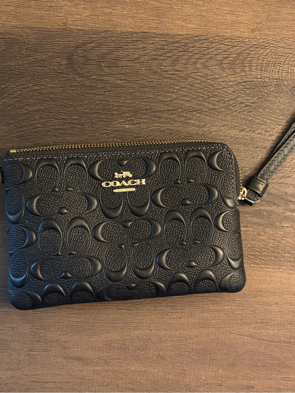 Coach Black Embossed Signature Wristlet with Gold Logo